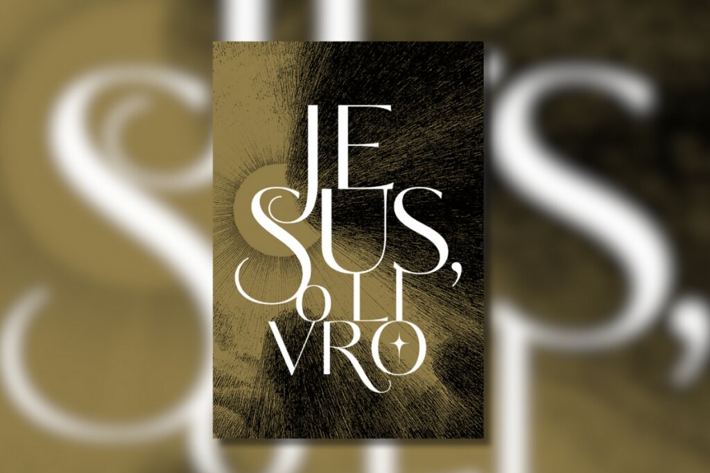 Capa da bíblia Jesus, o Livro com o nome do livro escrito em letras grandes em branco e um fundo preto e bege desfocado 