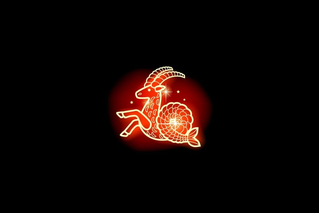 Ilustração em vermelho neon do signo de Capricórnio